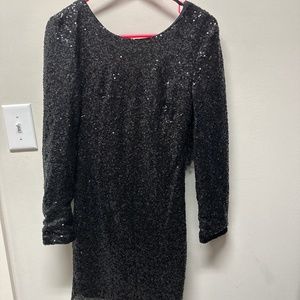 Black sequin mini with swoop exposed back